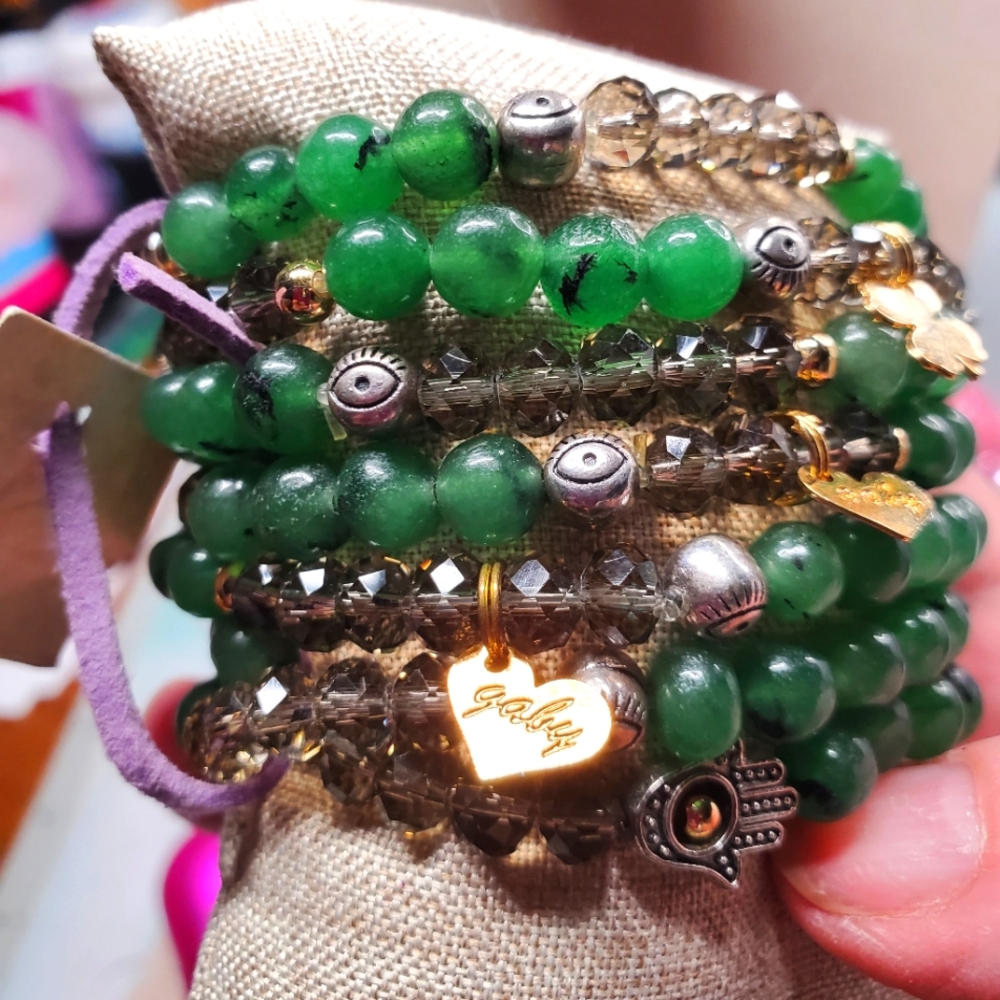 NWT 7 Green Aventurine stretchy bracelets with 4 leaf clovers and other charms.